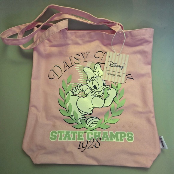 Skinnydip Handbags - Disney Skinnydip London Daisy Duck State Champs Pink Canvas Tote Bag NWT